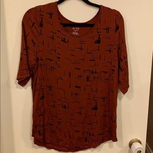 New w/o tags burnt orange and black soft tee